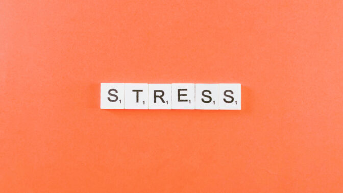 Stress - Tiles on orange background