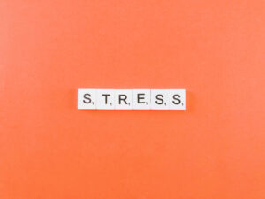 Stress - Tiles on orange background